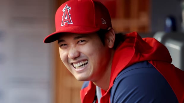Apr 19, 2023; Bronx, New York, USA; Los Angeles Angels designated hitter Shohei Ohtani (17) laughs in the dugout before the start of a game against the New York Yankees at Yankee Stadium. Mandatory Credit: Brad Penner-USA TODAY Sports